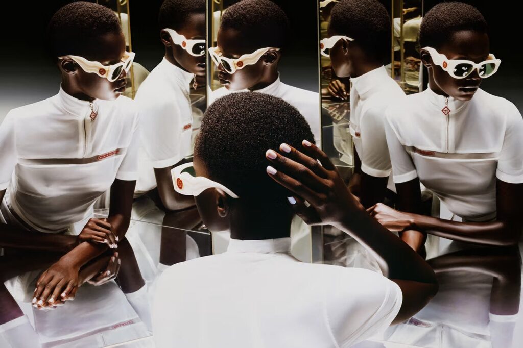 High fashion editorial photography with artistic flair | Cinematic short film still with dramatic lighting | Fashion model in designer wear on urban set | Behind-the-scenes photo from fashion film production | Stylish portrait with bold creative direction | Designer accessories showcased in luxury shoot | Art-driven fashion campaign photo | Black and white fashion editorial close-up | Conceptual fashion scene blending design and storytelling | Avant-garde fashion look with studio lighting